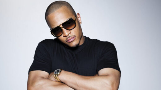 T.I. is accused of punching a member of the chain smokers over a cheek kiss.